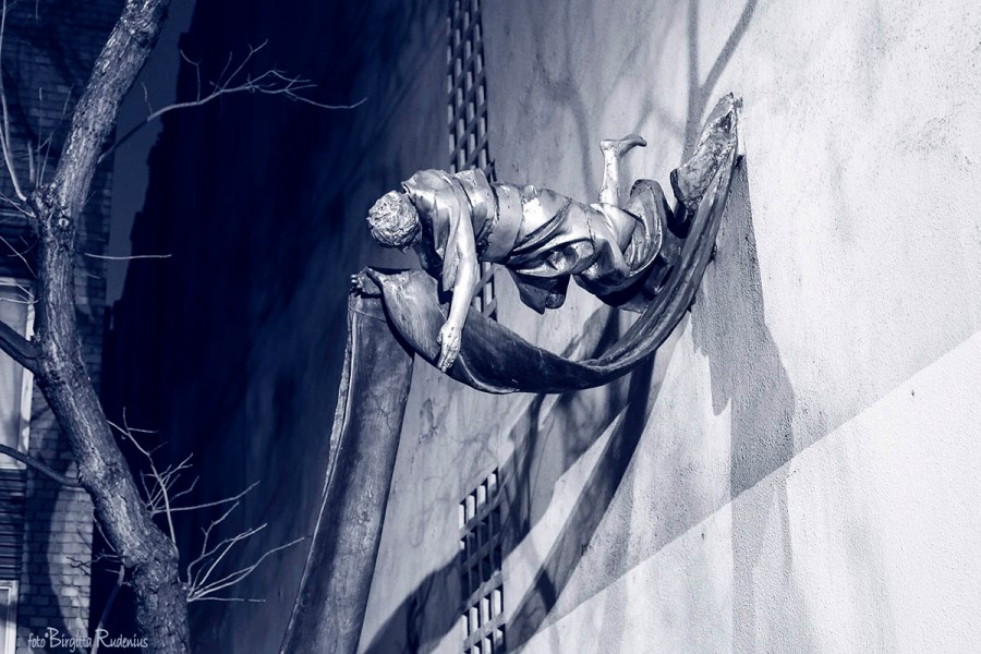 Blue Statue on the Wall